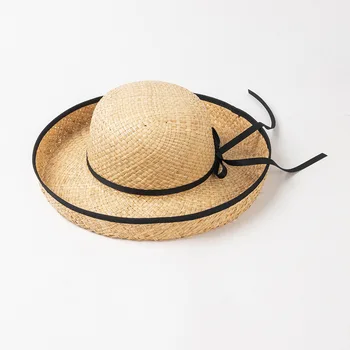 Kore versiyonu yeni moda bağlama yay haddelenmiş kenar Rafya havzası şapka açık seyahat güneş koruma siperliği hasır şapka